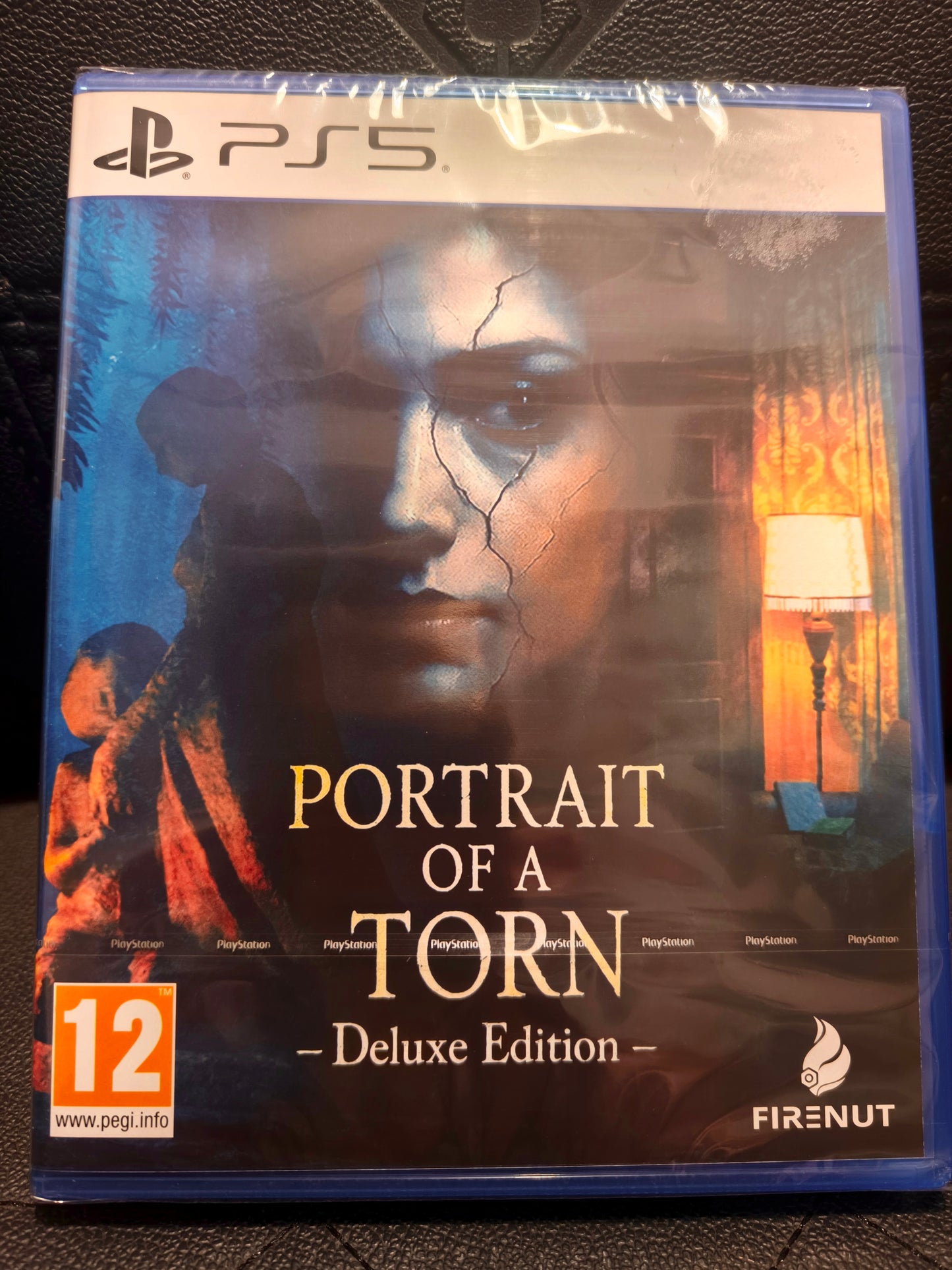 Portrait of a torn Deluxe edition ps5 sealed